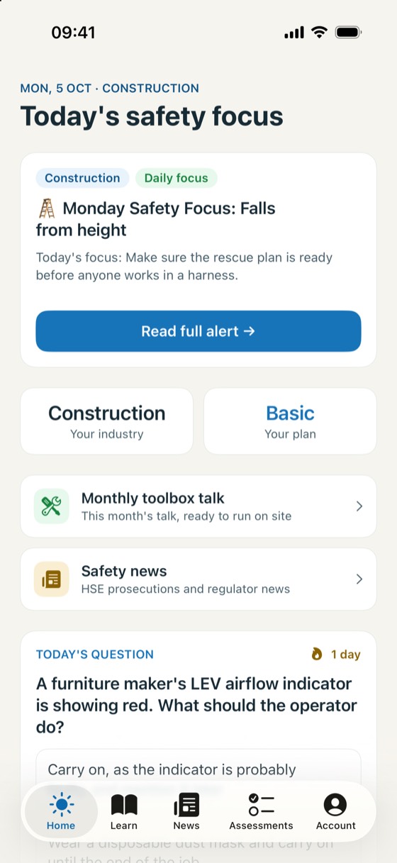 The app's Home screen showing today's safety focus, the monthly toolbox talk and today's question